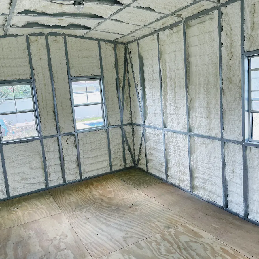 Closed-cell spray foam insulation applied to wall cavities in a residential project in West University Place